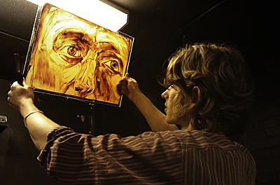 George Sander Jackson working on the glass